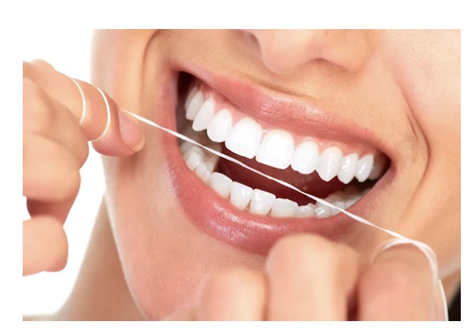 How to Floss and Brush With Braces or Invisalign